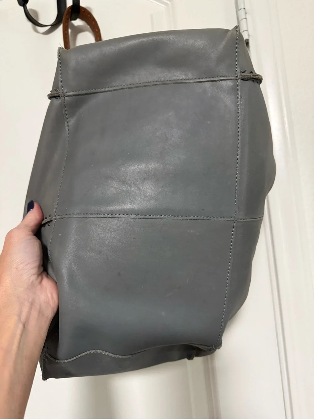 The Sak Gray Leather Hobo Shoulder Bag with Brown Strap and Tassels